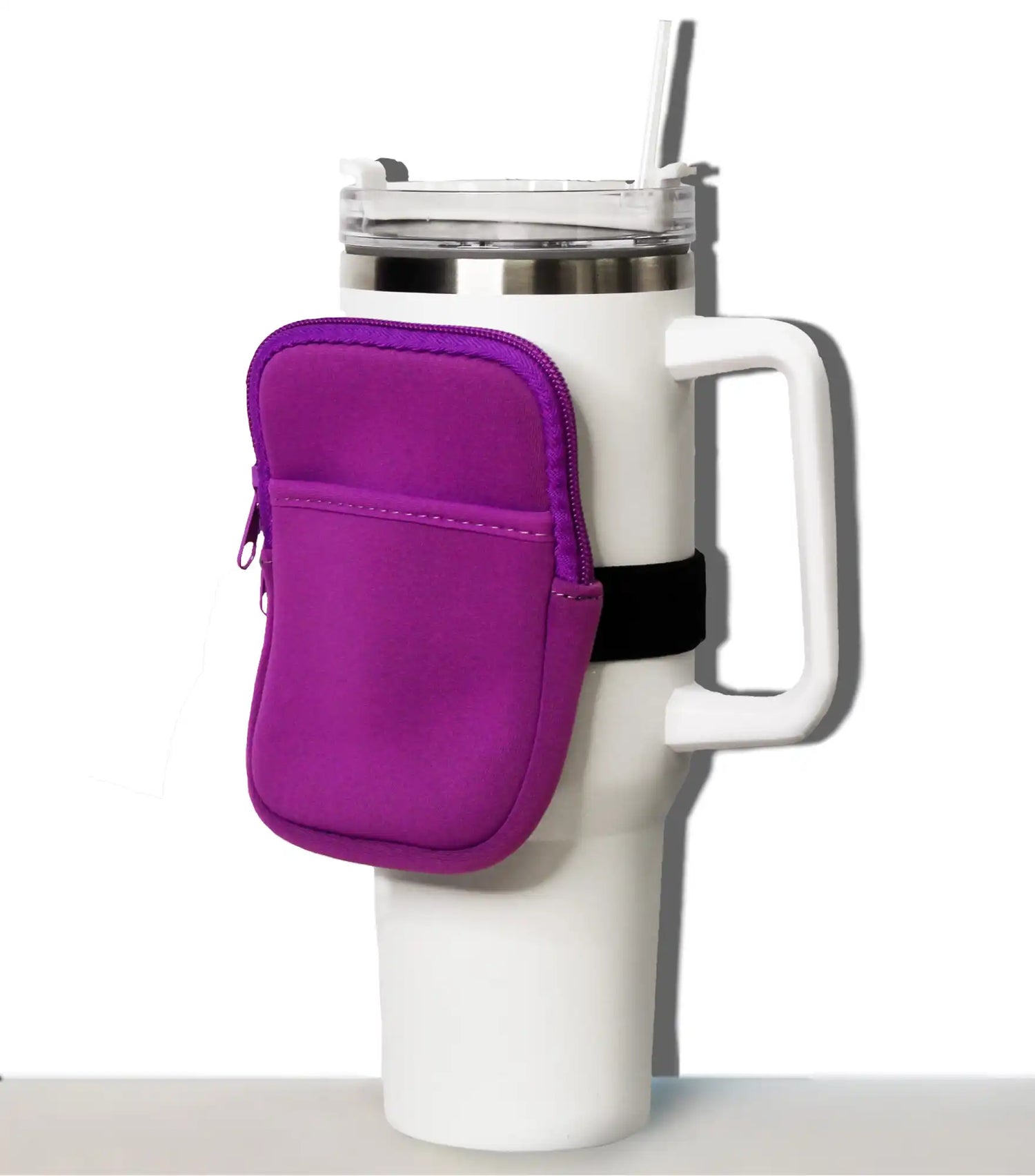 White insulated tumbler with a purple zippered pouch attachment.